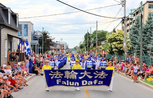Image for article Falun Dafa beliebt wegen „Botschaft der Ruhe, des Friedens und der Hoffnung“ bei Parade zum Nationalfeiertag im kanadischen Québec